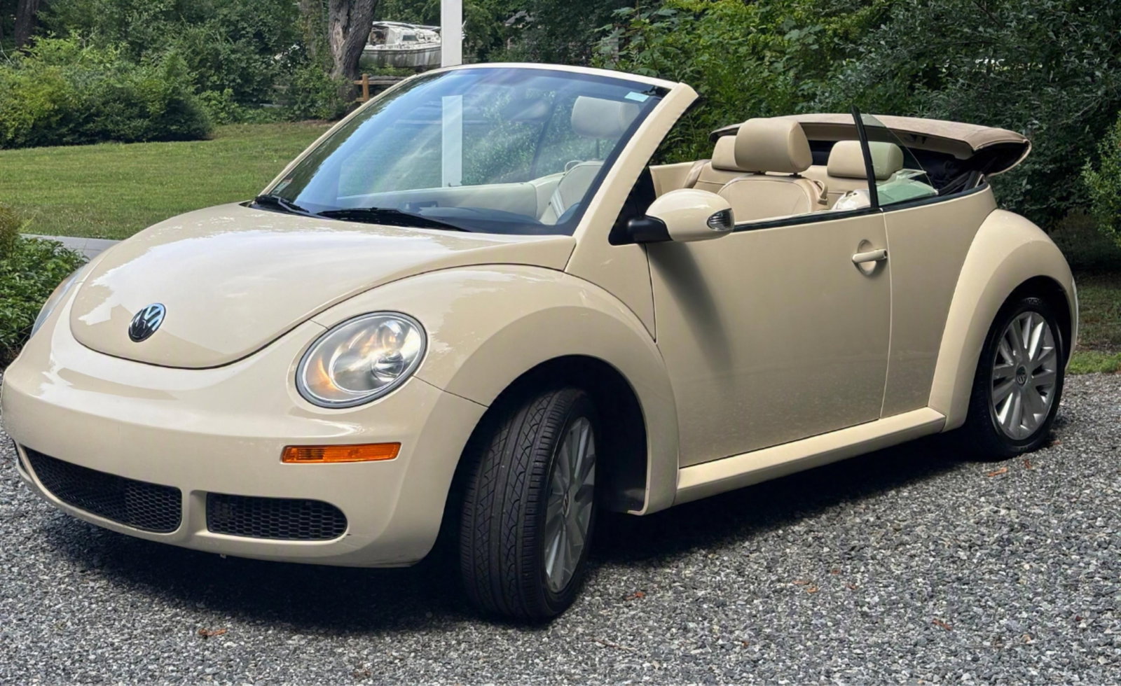 2008 VOLKSWAGEN BEETLE CONVERTIBLE AUTO: 2008 Volkswagen New Beetle convertible 2 door automobile in cream color with only 7400 original miles. 4 passenger, 5 cylinder. VIN #3VWRG31Y28M406196. Leather cream-color interior. No dents, no rust