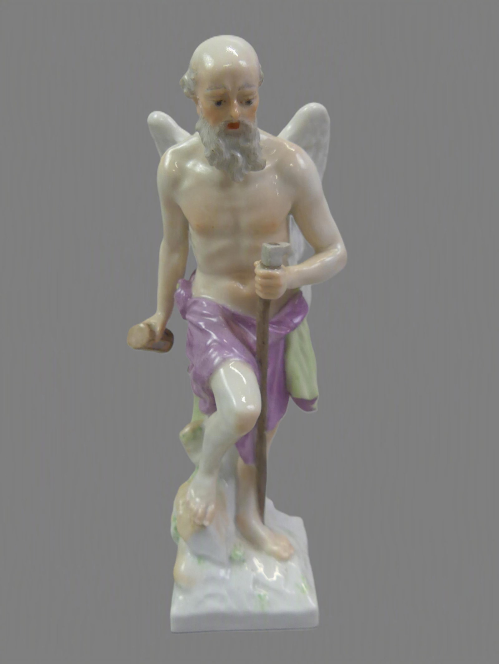 KPM PORCELAIN FIGURE OF CHRONOS: 19th century KPM (Royal Porcelain Factory of Berlin) porcelain figure of a winged Chronos (Father Time in Greek mythology). 6.5 in tall. VG condition. Has blue underglaze scepter mark.