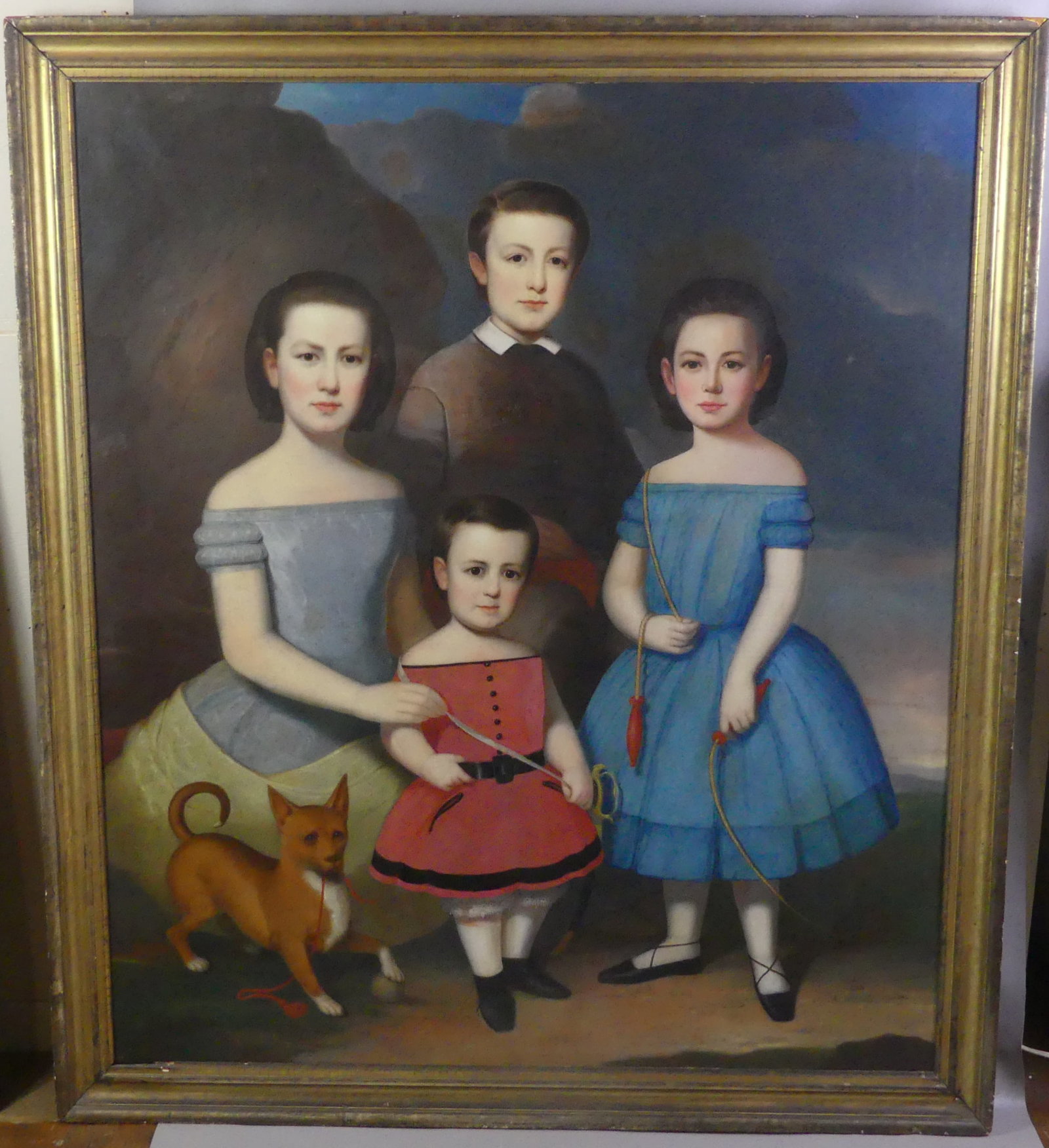 LARGE FOLK ART PORTRAIT ATTR. ROBERT STREET: Large unsigned mid-19th century folk art oil portrait (on canvas, relined) of 4 children in landscape with dog, attributed to Robert Street (1796-1865 Penn. portraitist). One child holds a jump rope,