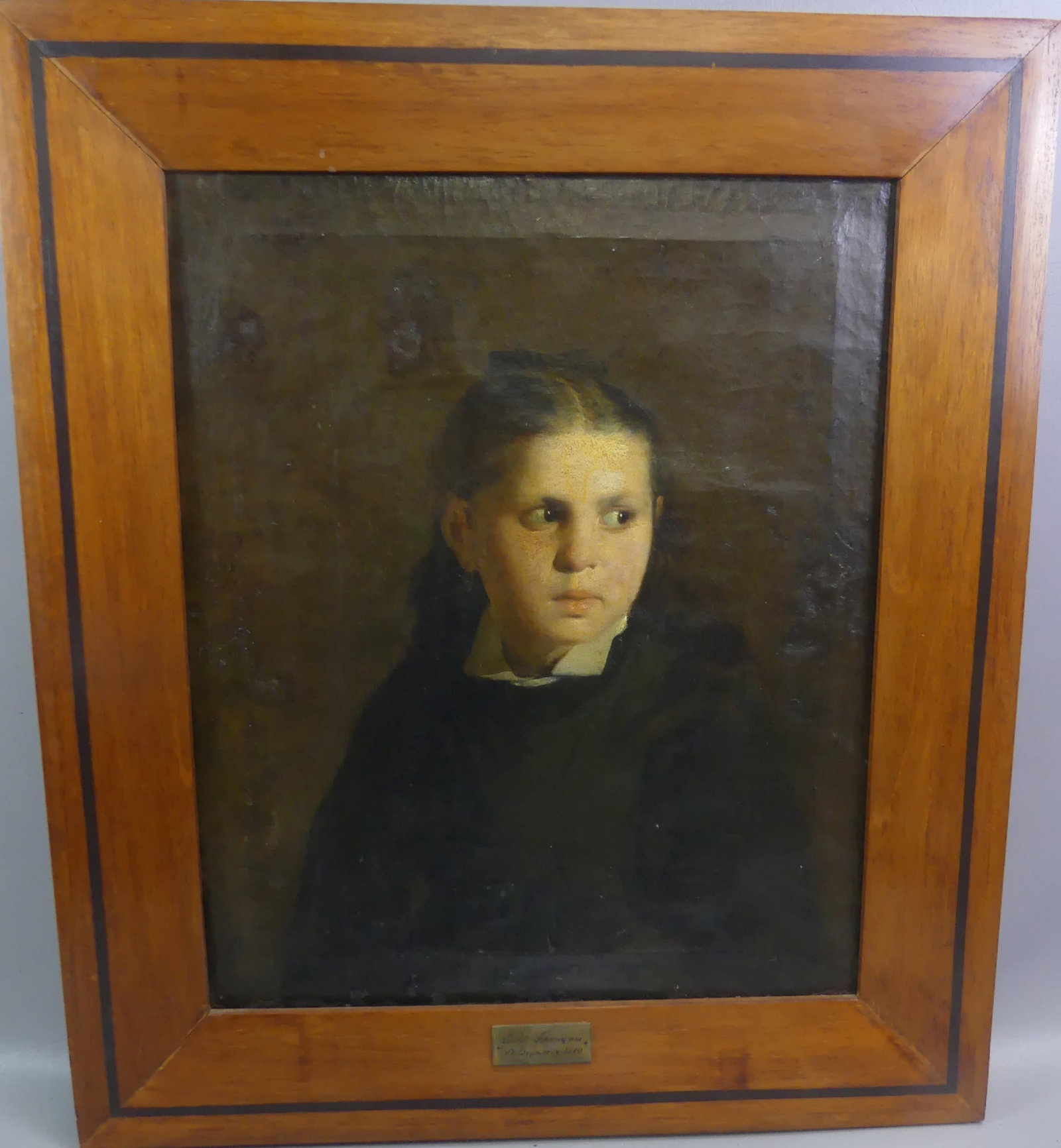 FRENCH SCHOOL PORTRAIT OF GIRL 1910: Antique oil portrait on canvas of a young girl, unsigned but has French plaque --Ecole Francais 1910 A. On---. 23.5 x 19.5 in, overall 29 x 25 in. Has restoration.