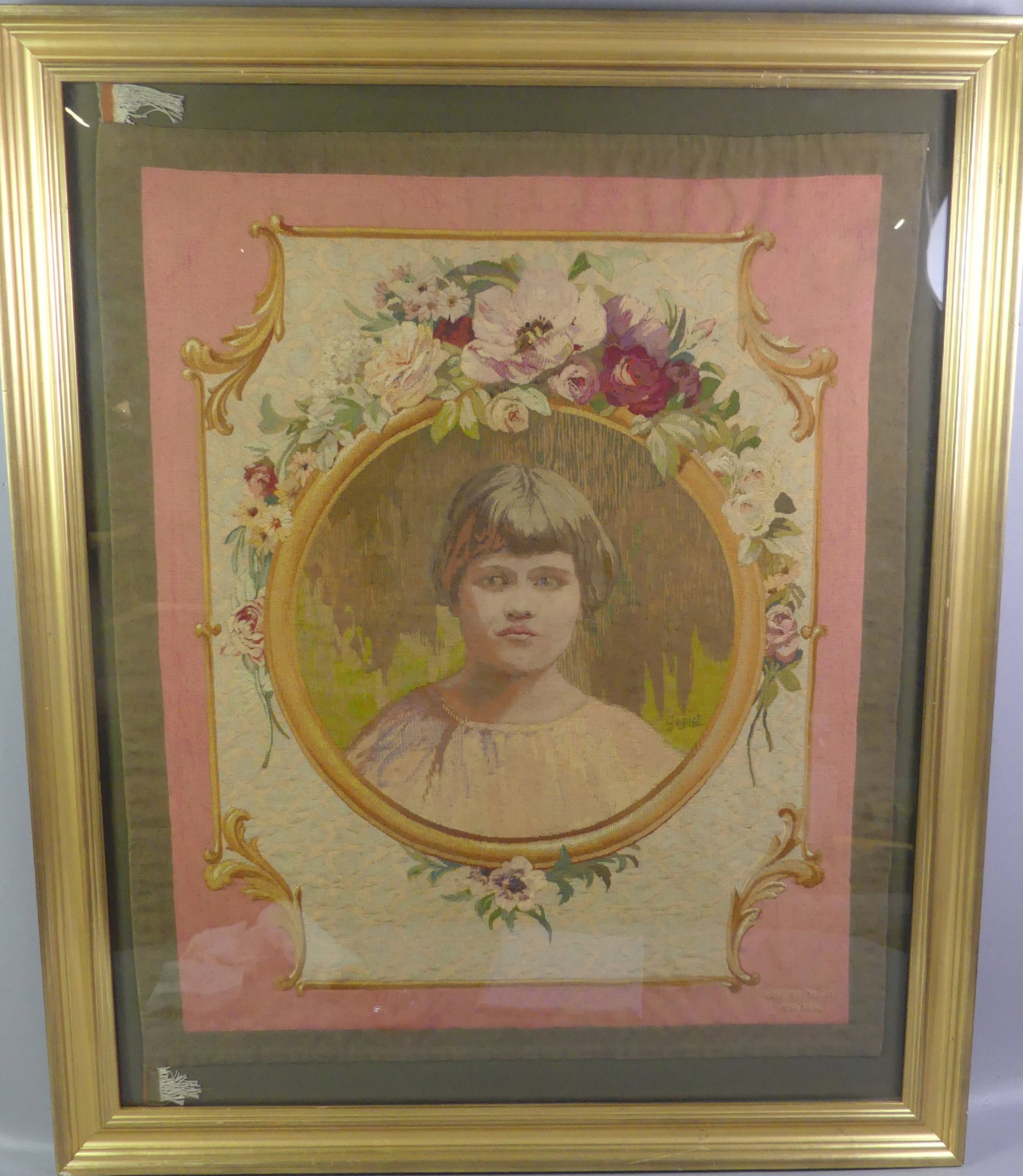 GOBELIN FRENCH TAPESTRY - PORTRAIT: Fine 19th century French framed tapestry with circular portrait of a girl framed by flowers and signed GOBELINS and CONNET TEXIT. 36 x 30 inches, framed 45 x 37. VG condition. NOTE: The Manufacture