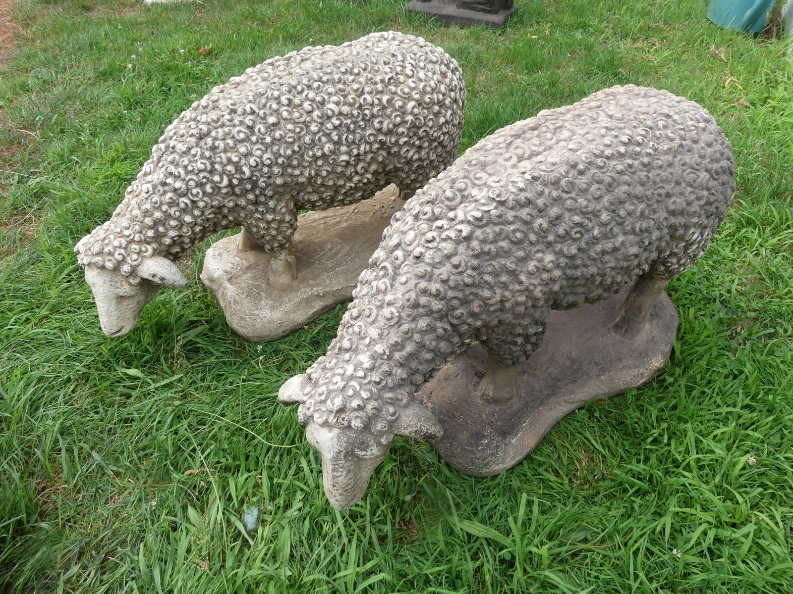 PAIR STONE GARDEN SHEEP STATUES: Pair of heavy vintage garden statues (stone or cement) in the form of sheep. 27 x 12 x 15 inches. VG condition.
