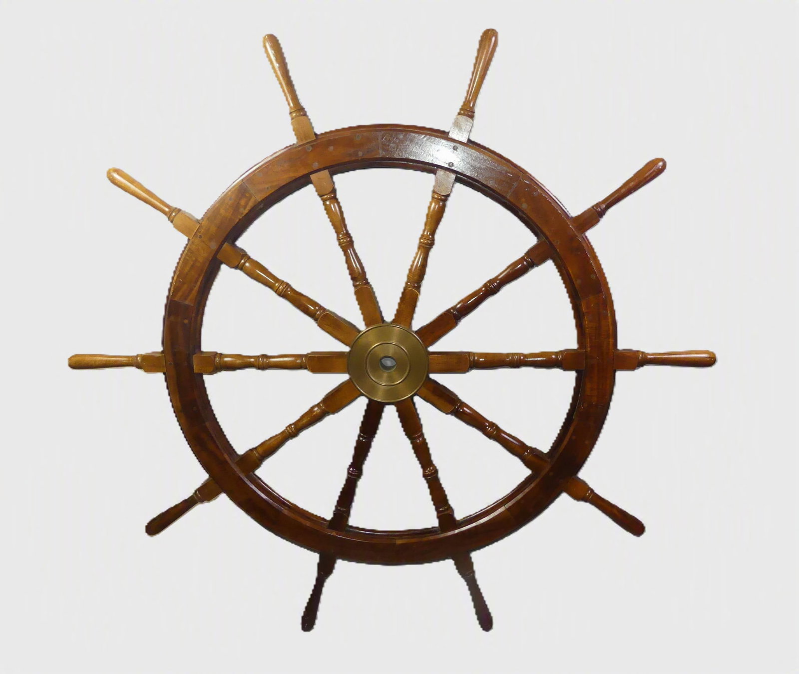 5 FT SHIP'S WHEEL: Large old teak or walnut ship's wheel with brass hub. 66 inch diameter.