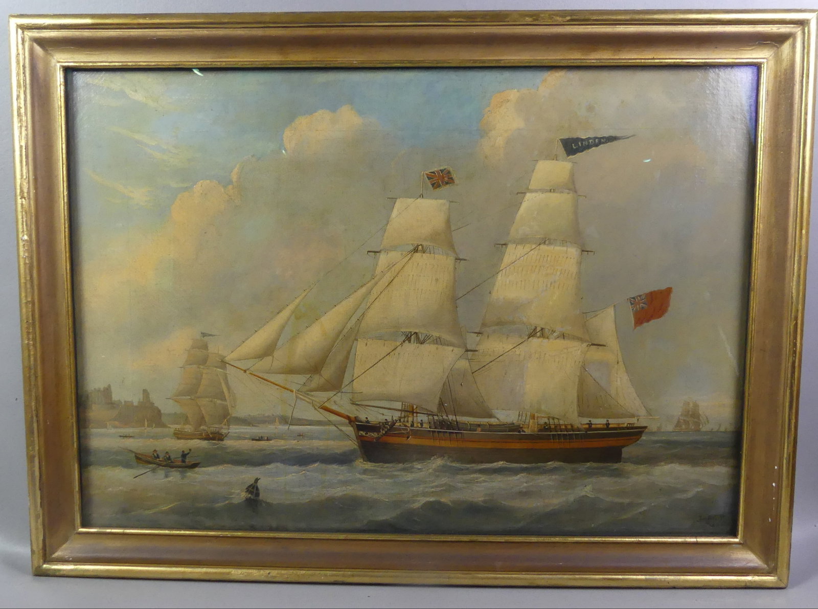 J. SCOTT 1848 CLIPPER SHIP PAINTING: 19th century oil painting (on canvas) under glass depicting the British Clipper Ship LINDEN signed J. Scott 1848. The ship is in harbor and shows 9 figures on board and 3 others in a rowboat. There