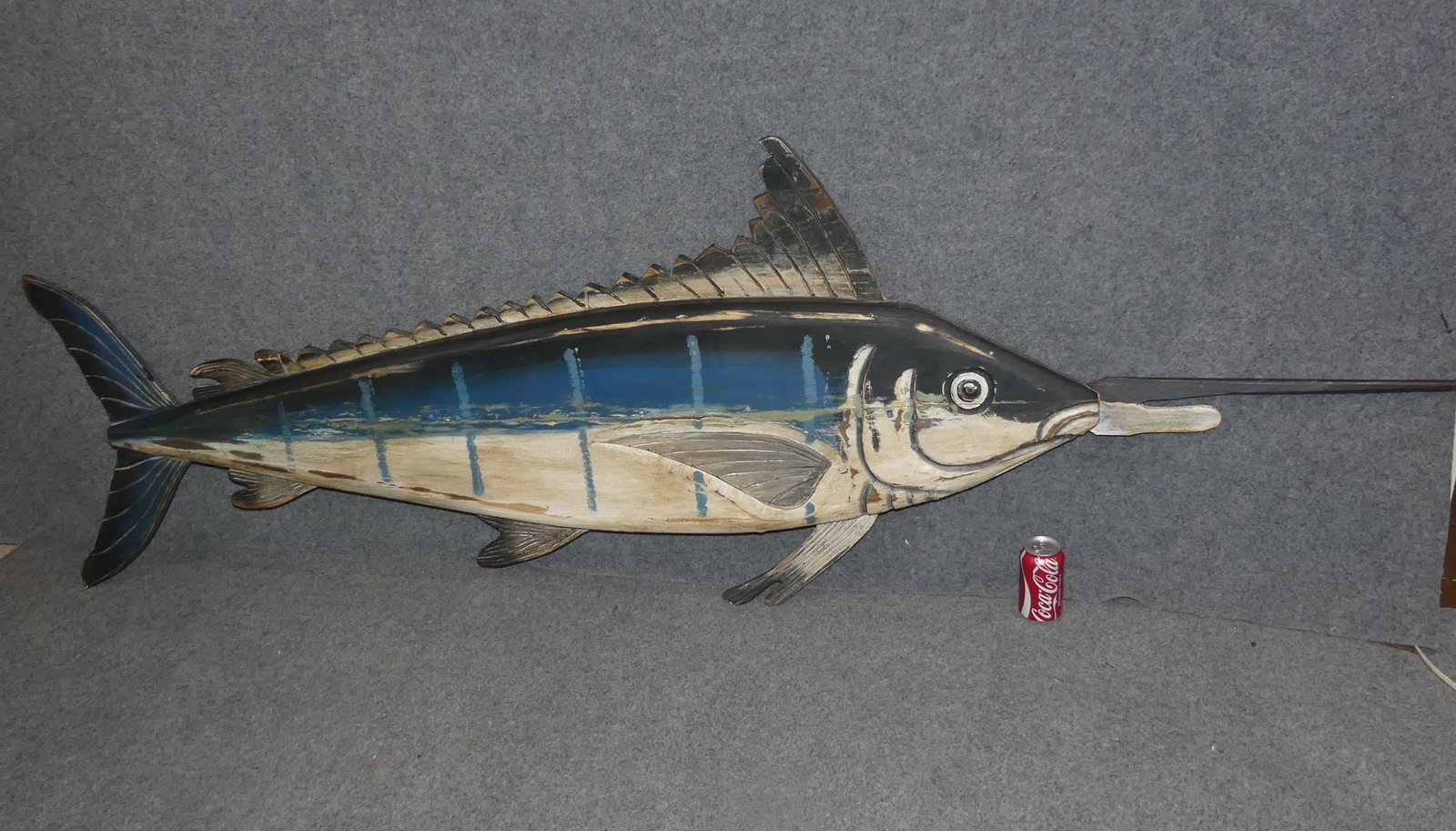 7 FT. PAINTED SWORDFISH PLAQUE: Large vintage painted wood wall plaque of a swordfish. 90 in long and 29 in high (sword is removable for transport and is 22" long).