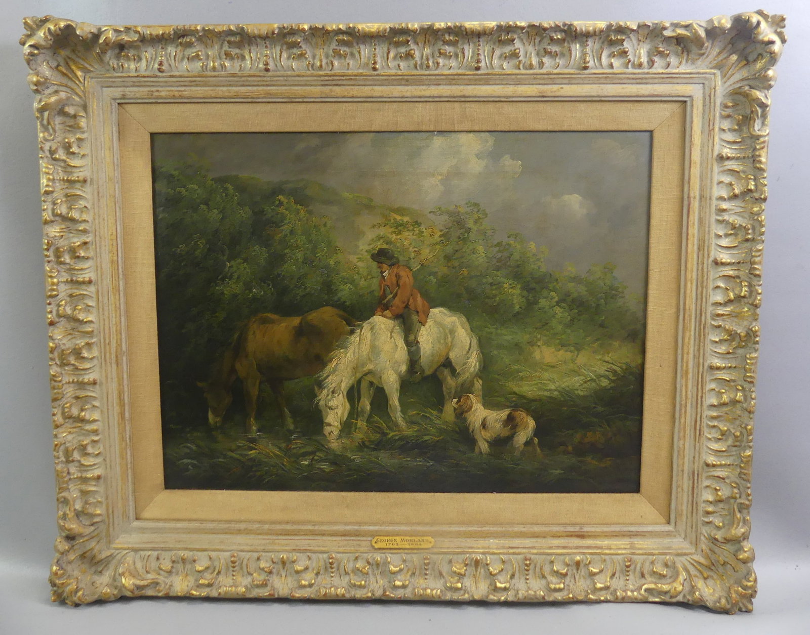 GEORGE MORLAND PAINTING - HORSES & RIDER: 18th century English oil painting depicting a country landscape with man on white horse with dog beside a riderless brown horse. Unsigned, painted by English artist George Morland 1763-1804