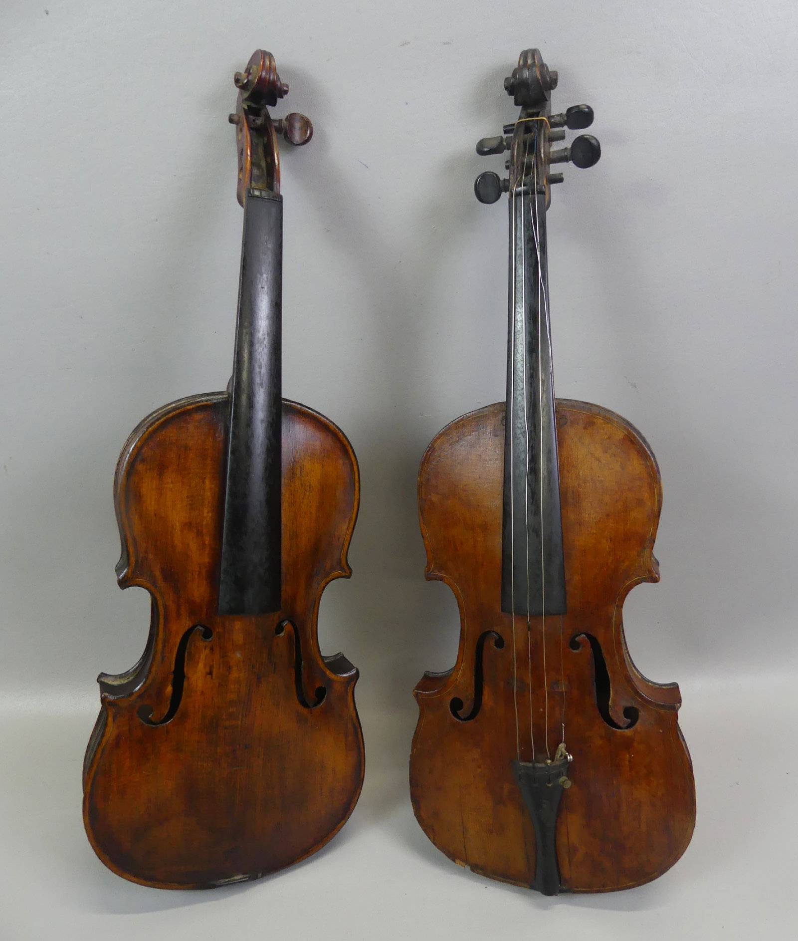 2 ANTIQUE VIOLINS: Lot of 2 antique unsigned violins to 24 in long. No cases.