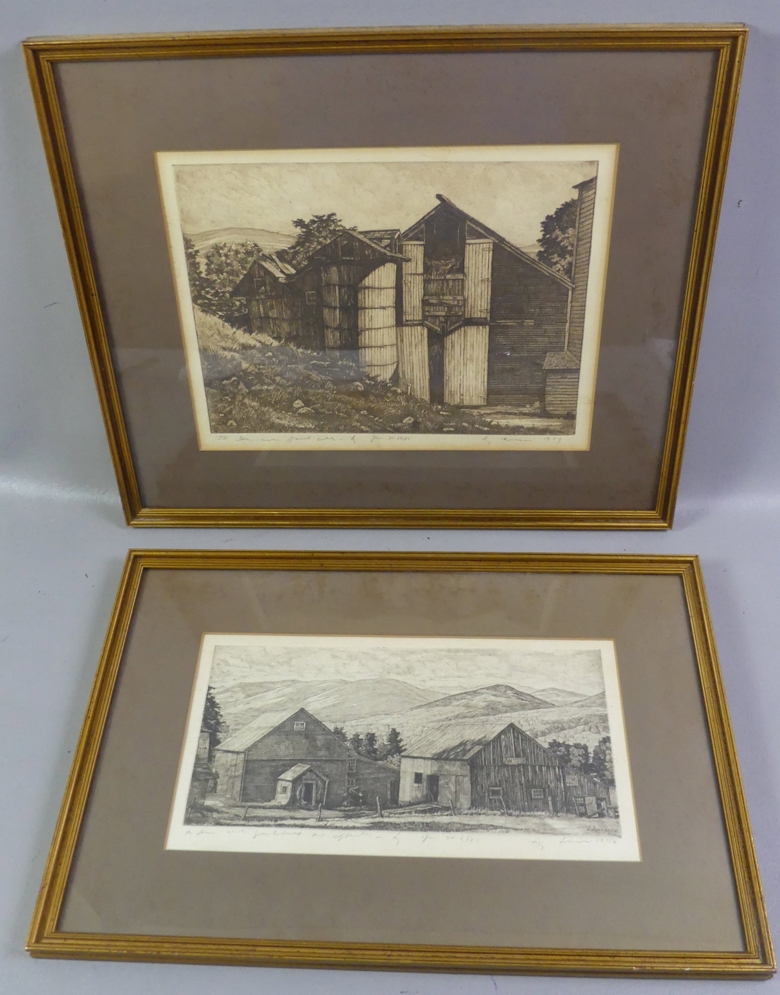2 LUIGI LUCIONI ETCHINGS: Lot of 2 Luigi Lucioni framed etchings: Old barns dated 1949, 9.75 x 12.75, framed 16 x 19 in; and a large farm in mountains dated 1946. @ size NOTE: Luigi Lucioni 1900-1988 NY artist -Lucioni became 