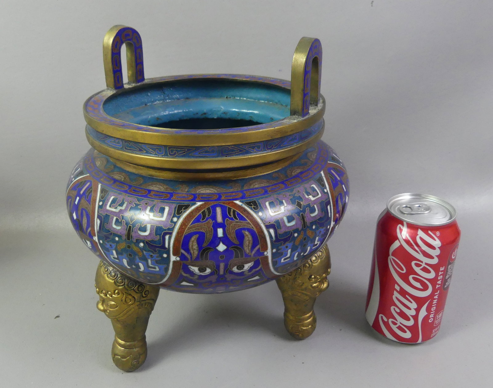 LARGE CHINESE CLOISONNE FOOTED INCENSE BOWL: Large 19th century Chinese cloisonne colorful enameled and handled incense bowl with 3 feet. 10.5 x 7.5 in high. VG condition.