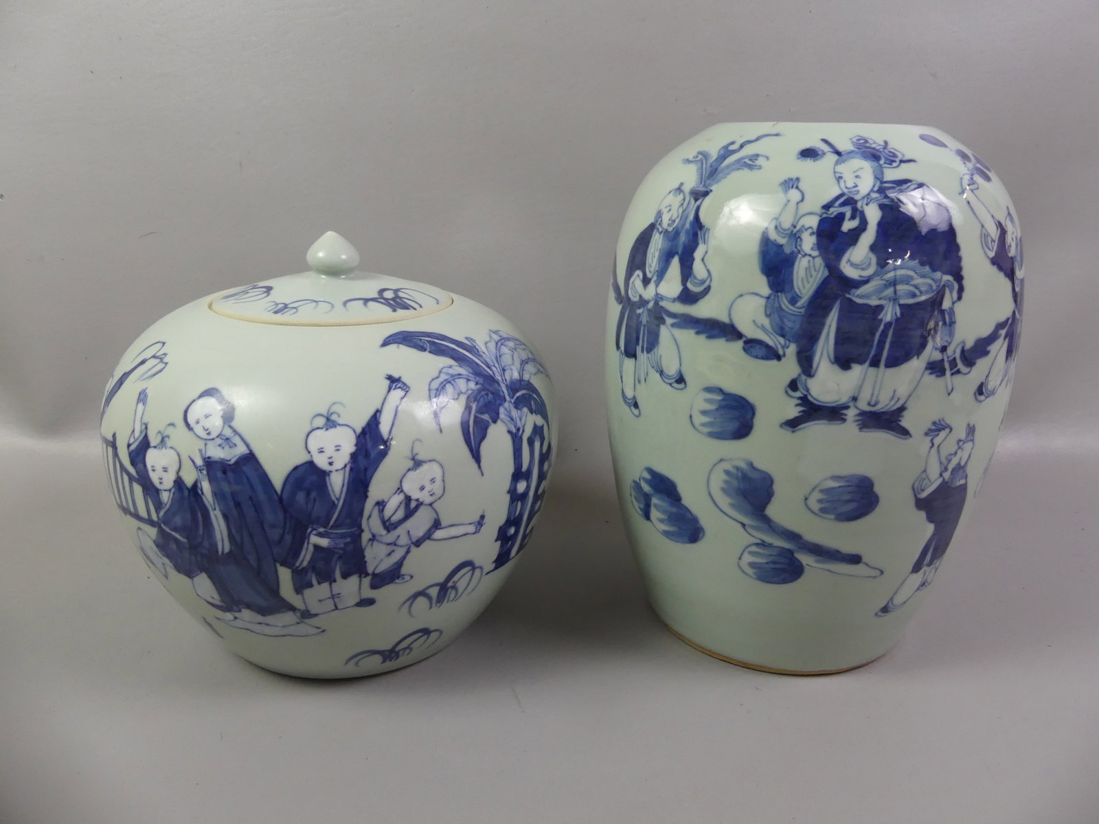 2 CHINESE CELADON JARS: Lot 2 Chinese celadon jars: 19th century 11 in tall (missing lid) and 20th century covered jar, 8 in tall. Both have genre scenes and unsigned.