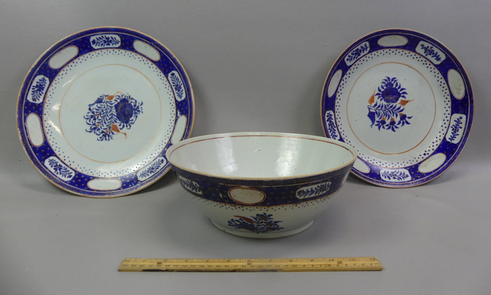 3 PCS. CHINESE EXPORT QIANLONG PORCELAIN: Lot 3 pieces of 18th century Chinese Export Qianlong porcelain with cobalt blue floral decoration: Pair of 13 in platters with light wear, no flaws; and 11.5 in x 4 in deep punch bowl with 3 in hairli