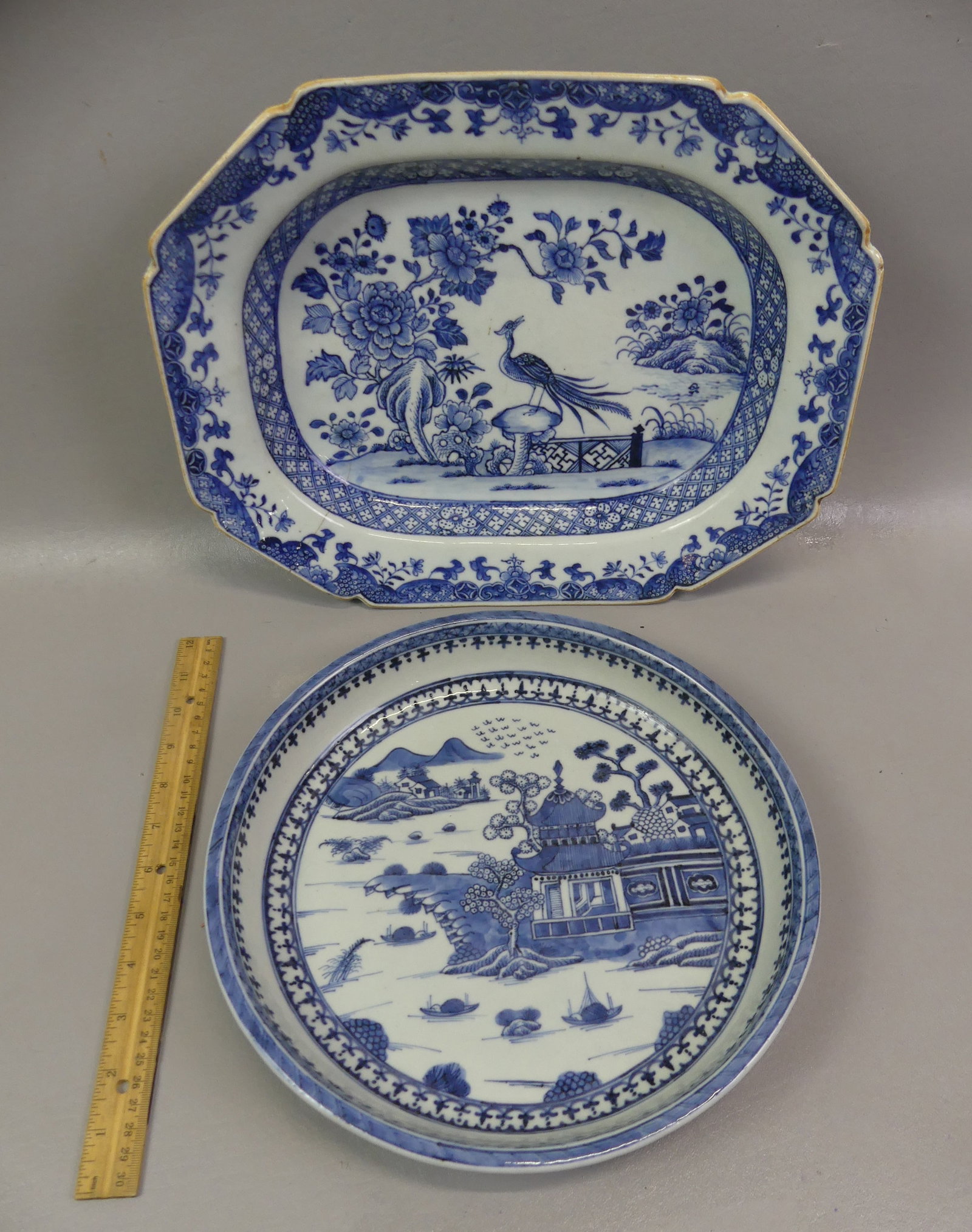 2 CHINESE BLUE QIANLONG SERVING BOWLS: Lot of 2 Chinese blue and white Qianlong 18th century serving bowls: 14.5 x 2.5 in deep serving bowl with exotic birds (2 cracks/1 chip); and round serving bowl, 11.5 diam by 1.75 in deep (perfect).