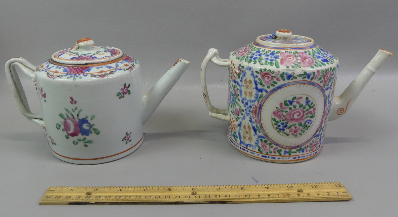 2 ANTIQUE CHINESE EXPORT DRUM TEAPOTS: Lot 2 Chinese Export 19th century drum-form teapots to 5.5 in tall: both having colorful floral designs, one VG condition; other has minor knicks on lid.