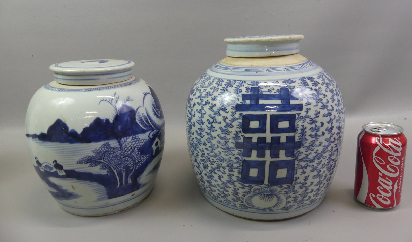 TWO ANTIQUE CHINESE CANTON GINGER JARS: Two 19th century Chinese Canton covered ginger jar: scenic with figures, 9 in tall; and 10 in with Double Happiness symbols and flowers. Both VG condition.
