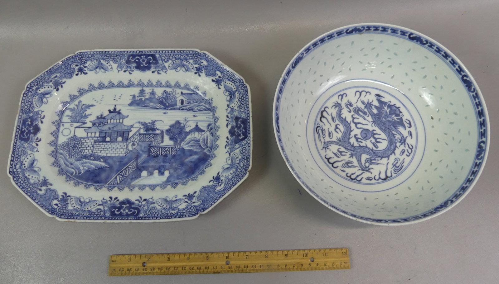 2 ANTIQUE CHINESE BLUE & WHITE ITEMS: Lot 2 Chinese blue and white serving items: 18th century octagonal scenic platter, 13 x 9.5 in (6 in ageline); and 19th century 10 x 3.5 in deep Linglong fruit bowl with translucent rice-eye and