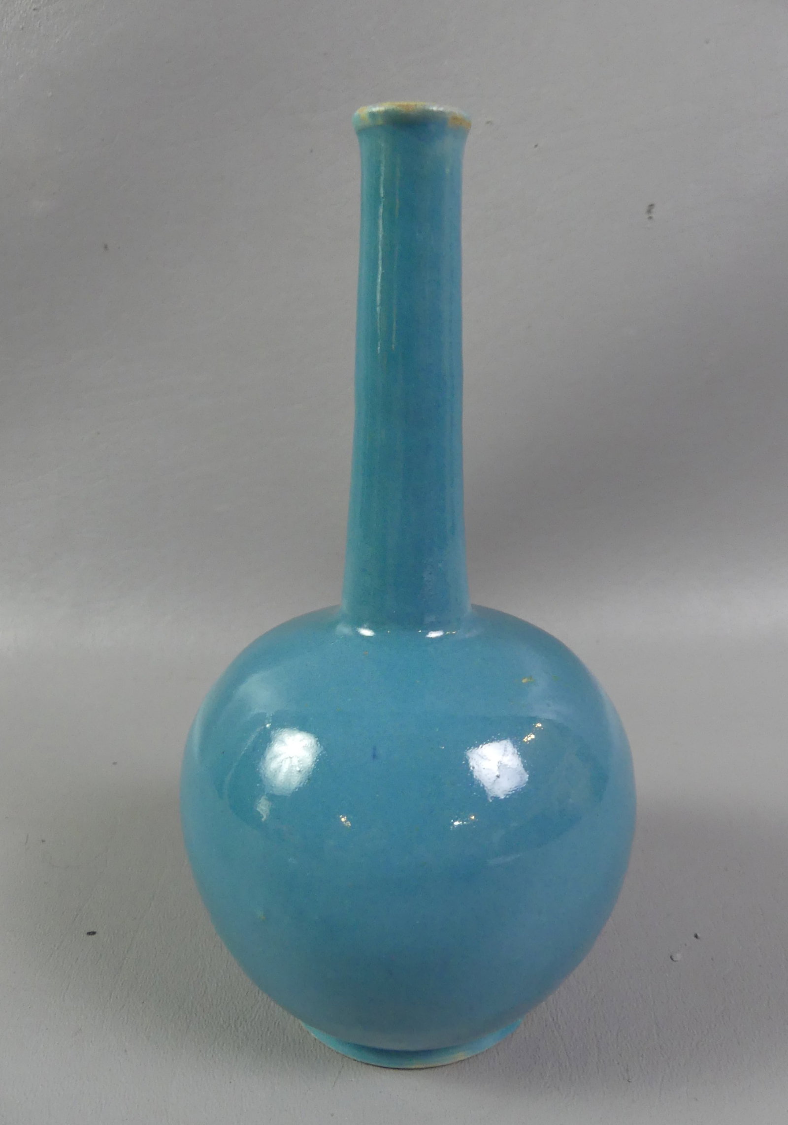 ANTIQUE CHINESE BLUE POTTERY VASE: Antique Chinese turquoise blue glazed pottery vase, 7 in tall. Good condition, unsigned.