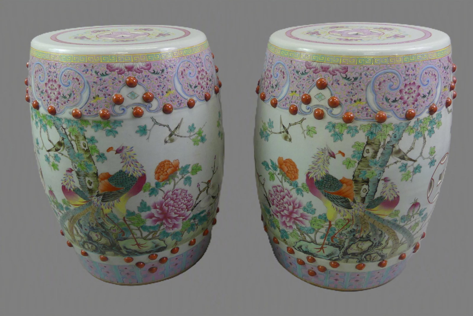 PR CHINESE FAMILLE ROSE GARDEN BARREL SEATS: Pair wonderful 19th century Chinese Famille Rose ceramic garden barrels with exotic birds, flowers, ducks, cranes, openwork symbols, etc. 18 in tall, top is 11.5 in diameter. Both in excellent