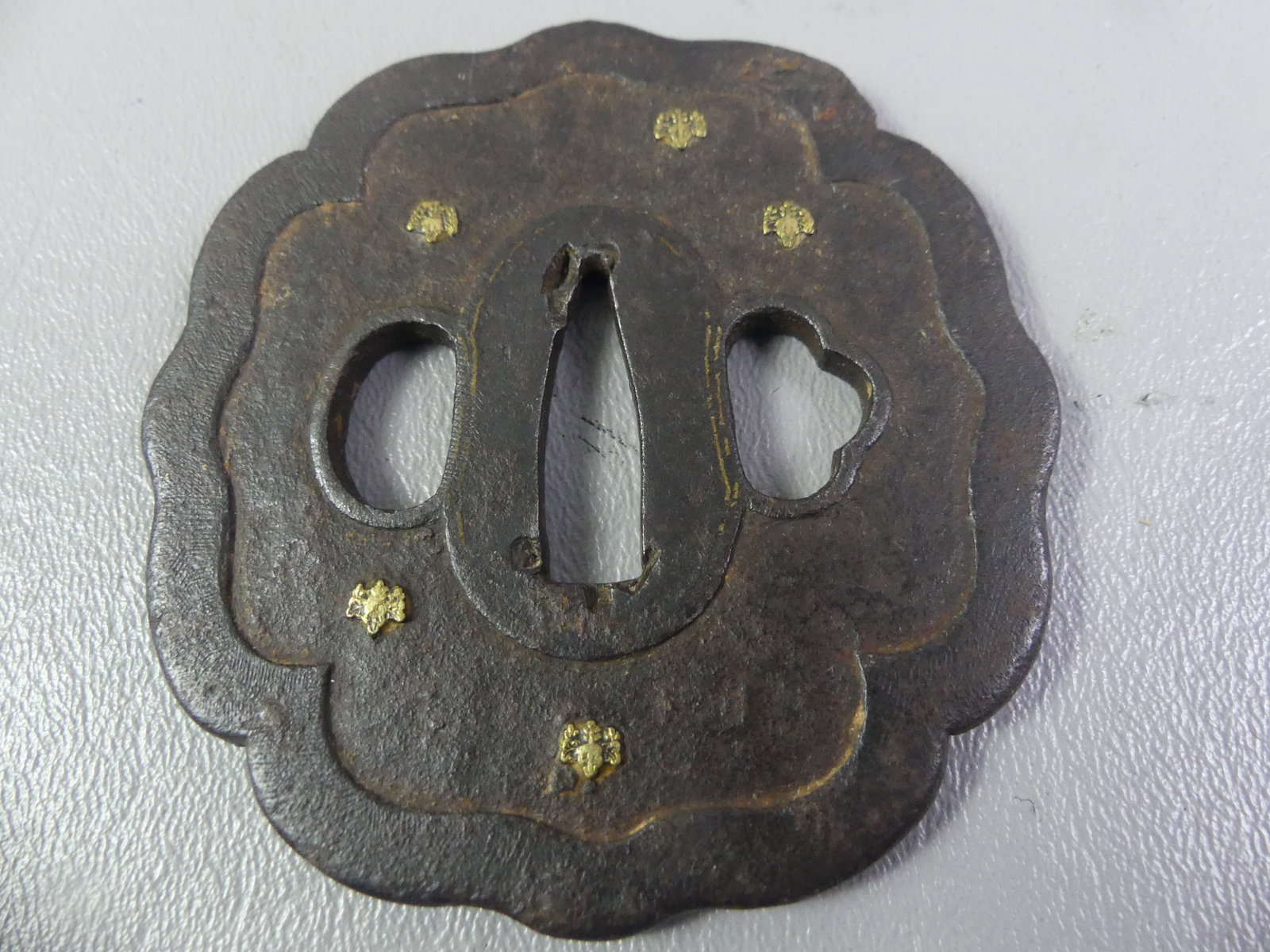 ANTIQUE IRON TSUBA - INSECTS: Edo period Japanese iron tsuba with scalloped rim and 5 gold insects. Unsigned. 3 x 3 inches.