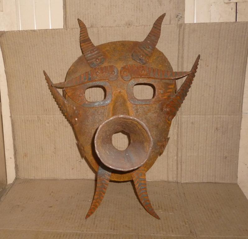 OLD MASK FUNNY IRON TORTURE SHAME HUMILATE: Old iron mask funny design, such were used in older century to punish person who does anything wrong in society. It was made wear to person who do bad / wrong in society and tie on tree or pole where