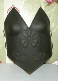 LADY WARRIOR PROTECTION FRONT PLATE IRON HAND FORGED: Rare protection plate for lady warrior with beautiful work hand made of iron. This protects from enemy attack.At sides there is arrangement to tie brest guard but belt is missing.This can be adjusted