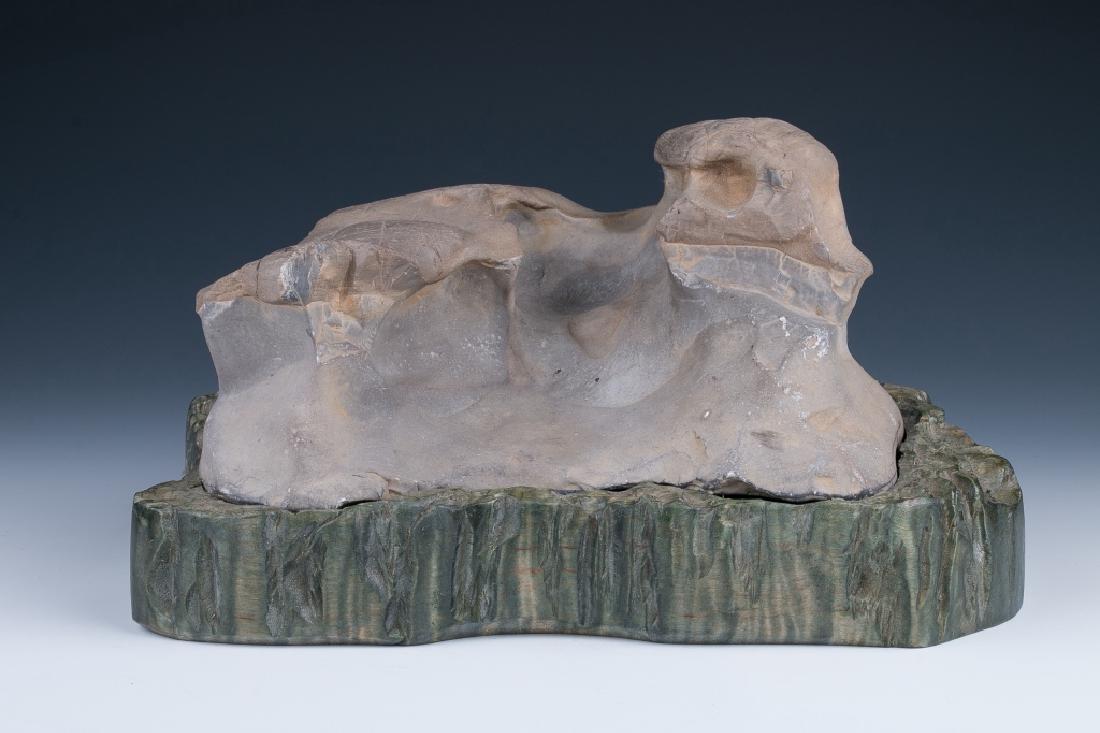 A WEATHERED STONE BOULDER W/ GREEN WOOD STAND (1 of 4)