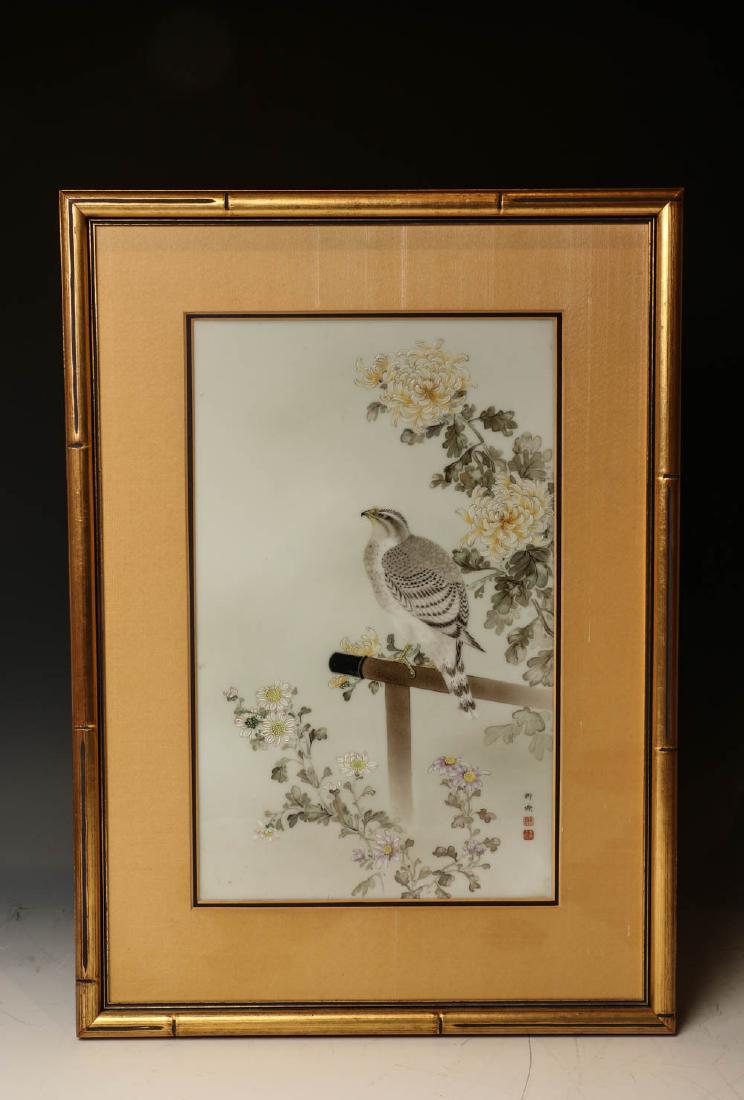 POLYCHROME ENAMELED PORCELAIN PANEL: Depicting a bird standing on a wood pole with chrysanthemum and daisy, signed by the artist with two seals. 22.3cm x 37cm
