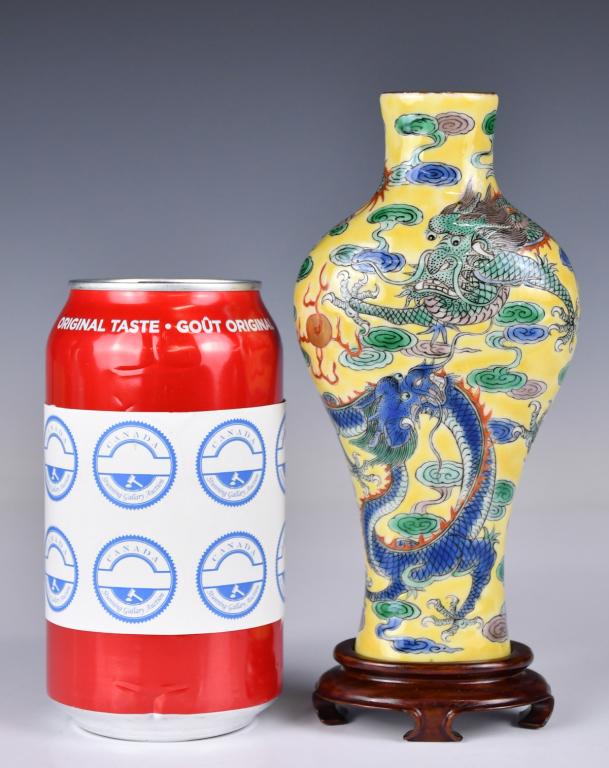 A Dragon Vase w/Stand Kangxi Mk Republican Period: In a compressed Mei vase form, around the exterior body is painted with two dragons amongst clouds with a flaming pearl, four-character Kangxi mark at the base, H: 15.8cm Provenance: From an important