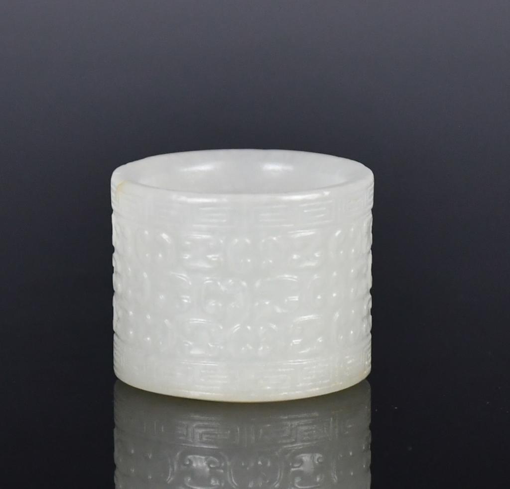 A White Jade Carved Archer's Ring, Qing (1 of 5)