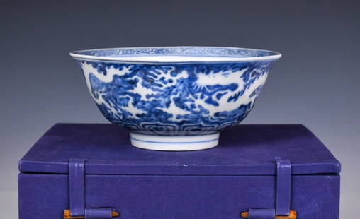 A Blue & White Dragon Bowl, Chenghua Mk & Prd: Of slightly everted rims gently rounded down to a short cylindrical foot, painted to the center interior with a fortune cloud medallion, and to the exterior depicted dragon and phoenix scene, marked o