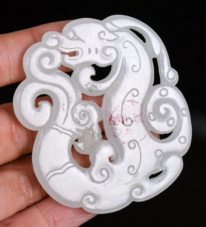 A White Jade Carved Dragon Plaque Qing (1 of 6)