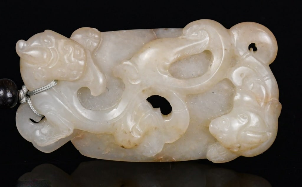 A White Jade Carved Shield Shape Plaque Qing (1 of 11)