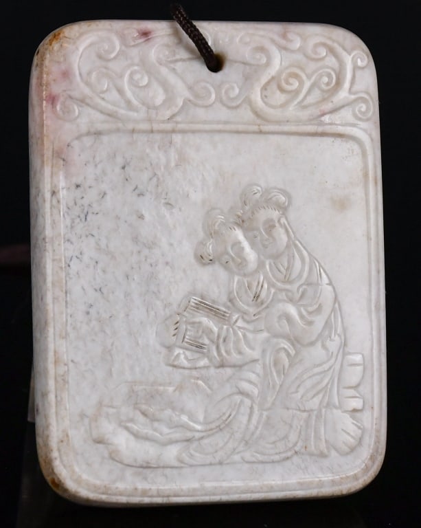 A Chicken-bone Jade Carved Plaque Ming: Of rectangular form, carved to one side with figures while the other side with inscription, L:5.6cm Provenance: Vancouver Hong Kong Immigration 明 雞骨白雕人物