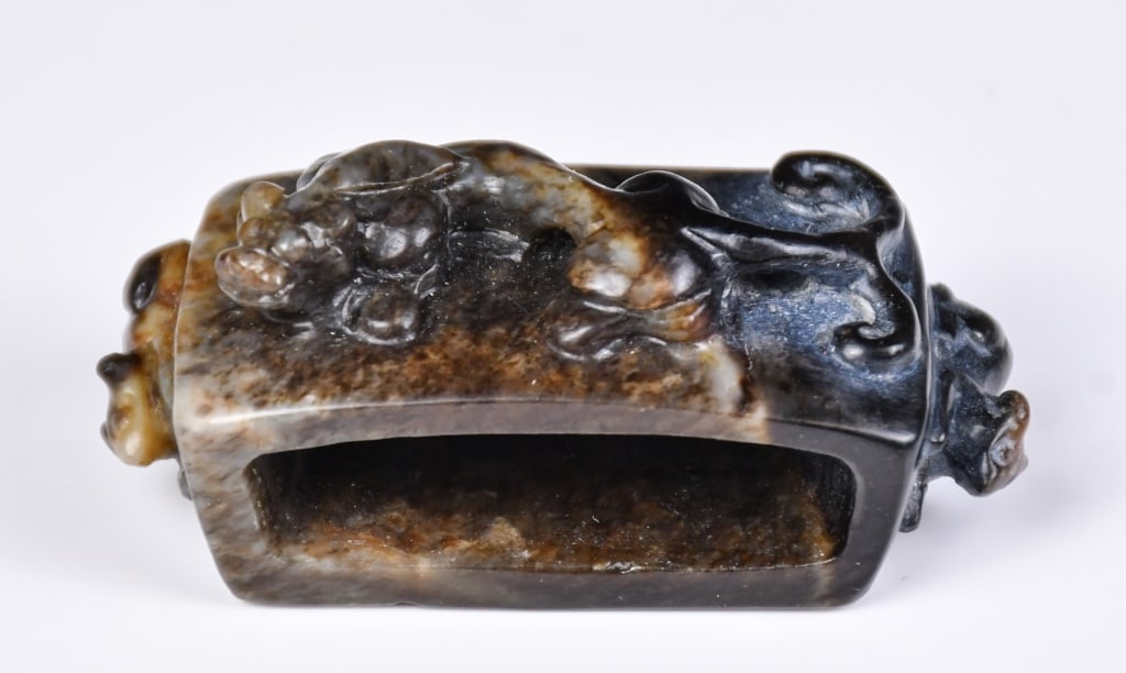 An Archaistic Brown Jade Chi Dragon Scabbard Slide (1 of 9)