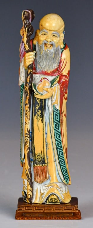A Bone-Carved ShouLao Statue w/Std: A bone carved statue of Shou Lao, in standing position, with color painted on. H:21cm 民國 加彩骨雕壽老立像