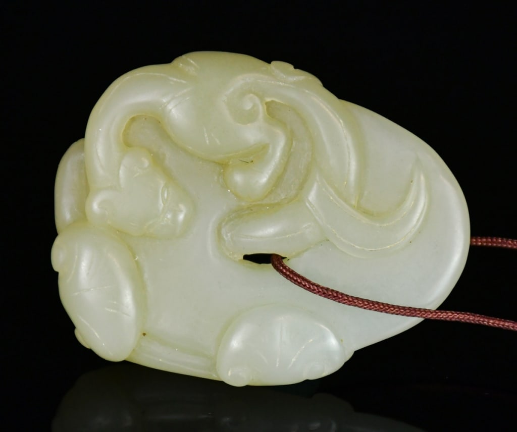 A Jade Carved Shield Shape Plaque Qing (1 of 8)