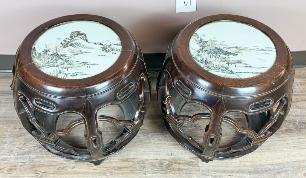 Pair Famille Rose Plauqes Inlaid Hardwood Stools: Both of circular form, each inset to the center with a famille-rose porcelain plaque depicting a landscape scene, above a finely carved apron. Republican. D: 46cm, H: 43cm 民國