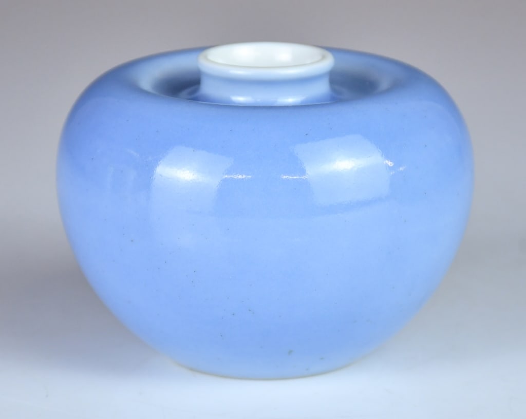 A Clair-de-Lune Glazed Waterpot Kangxi Mk & Period: Of classic 慳pple?form, the compressed globular body is masterfully potted with rounded sides rising from a recessed base to a short, waisted neck and a small circular mouth. The exterior is env