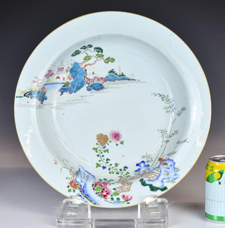 A Large Famille Rose Basin 18thC: The rounded sides rising from a tapering foot to a flat everted rim, the interior painted with flowers and landscape scene, D: 38.4cm, H: 7.9cm 18世紀 粉彩庭園Ŏ