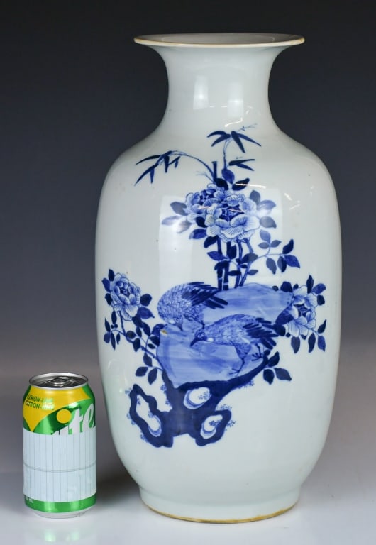 A Blue & White Lantern Vase Kangxi Mk Qing: Of lantern form, painted to the body with flowers butterfly and birds, four-character Kangxi mark at the bottom, H: 43.3cm 清 青花花鳥紋燈籠瓶 