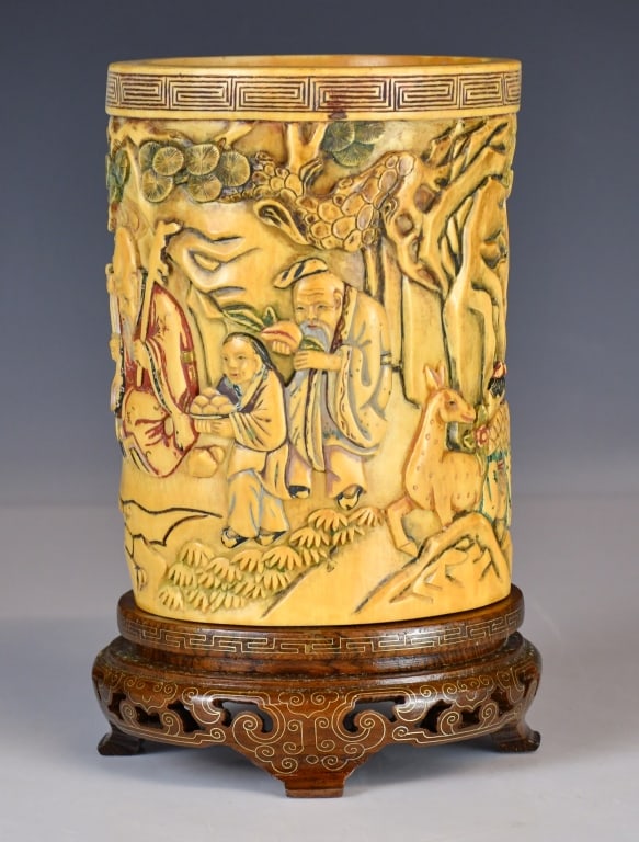 A Bone-Carved Brush Pot w/Std 1950-70s: Of cylindrical form, the exterior finely painted in colours with a continuous figural narrative scene. H: 16.7cm, D: 12.5cm 建國期 加彩骨雕大筆
