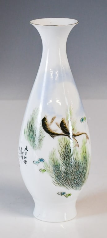 A Famille Rose Vase Qianlong Mk w/Box 1950-70s: A delicate thin porcelain vase, the pear-shaped body rises from a tall tapered foot, to a cylindrical neck then a flared rim, around the front of body painted with fish in water, marked on the base wi
