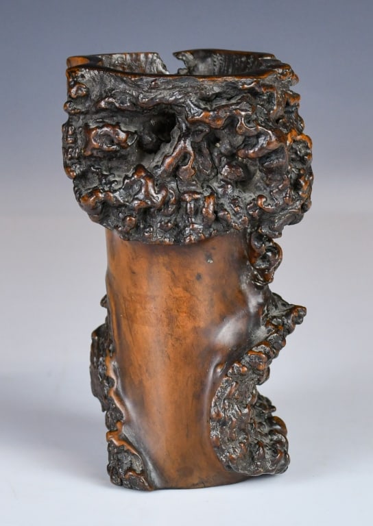 A Naturalistic Burlwood Tree Stump Brush Pot 18thC: Of irregular, gnarled cylindrical form, the vessel is masterfully fashioned from a single section of burlwood (often referred to as yingmu). The exterior is left largely in its natural state. H:15cm 1
