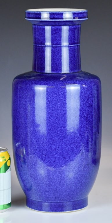 A Powder-Blue Glazed Rouleau Vase Kangxi Mk 19thC: Of cylindrical rouleau form, supported on a short, slightly tapered foot, rising to a prominent rounded shoulder and a tall, tubular neck. The neck is articulated with a subtle horizontal rib and term