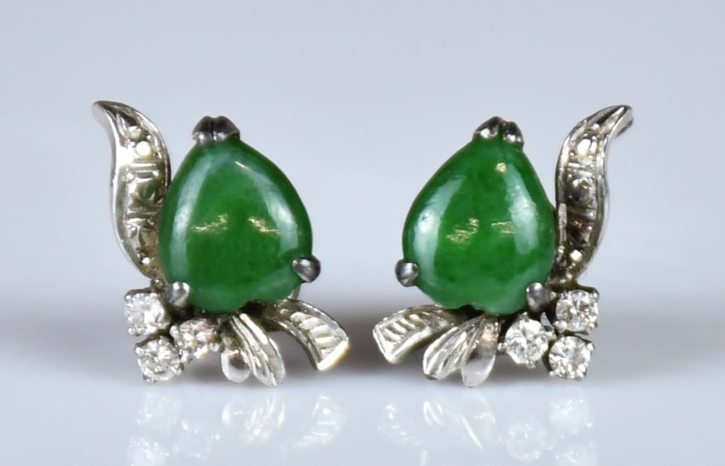 Pair of Jadeit & Diamond Platinum Earrings: Set with jadeite within diamond accents, mounted in platinum. NOTE: ONLY WIRE TRANSFER PAYMENT ACCEPTED FOR THIS LOT. All sales proceeds will donate to the Greater Vancouver Food Bank. 