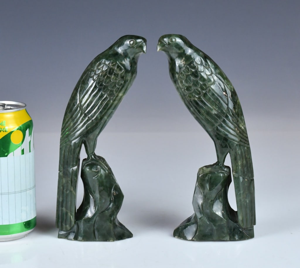 Pair of Spinach-Green Jade Bird Ornaments Republic: A pair of jade carved parrots, the stone overall in spinach green color tone, H:19cm each. 民國 碧玉雕對鳥擺件 Click here for natural