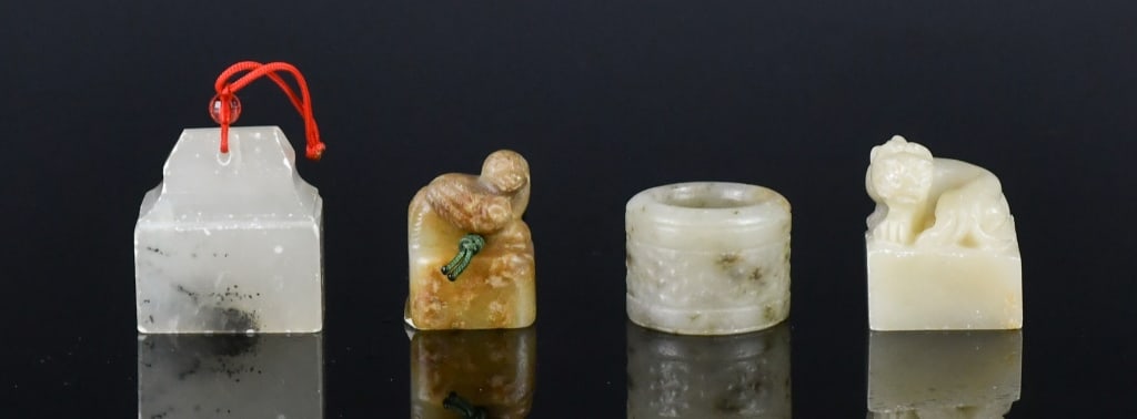 3Pcs Jade Seal Stones & 1 Thumb Ring Republican: Comprising 3 jade stone seals, largest seal size:3.4x2.2x3.6cm, and a thumb ring inner 2cm, outer 3cm 民國 玉石章料3個及扳指1枚