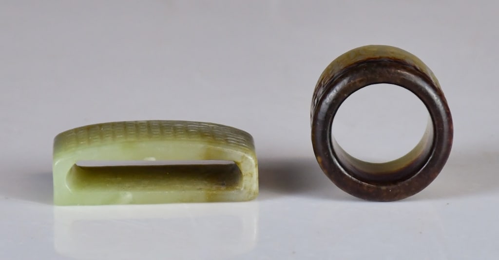 An Archaistic Jade Sword Fitting & A Thumb Ring - 6