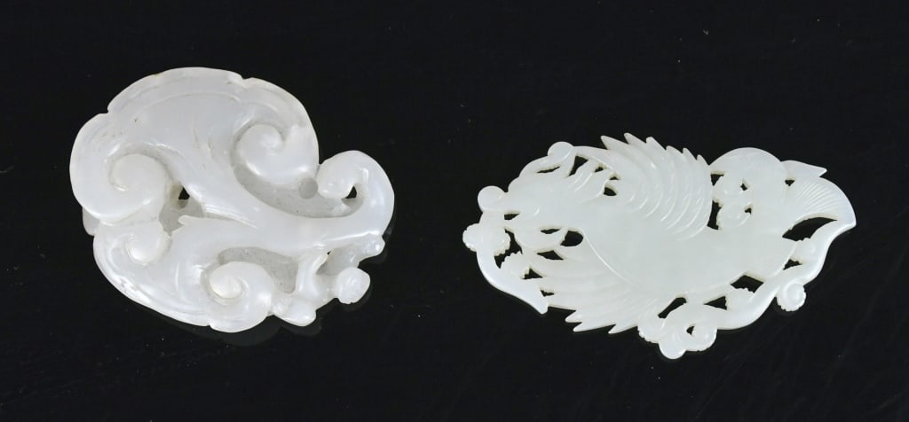 A Group of 2 Jade Carvings w/Box Republican: Comprising two jade carvings, one worked in the form of a lingzhi fungus, the other carved in openwork as a phoenix, both in white tone. Larger: 6.6x3.4cm 民國 白玉雕