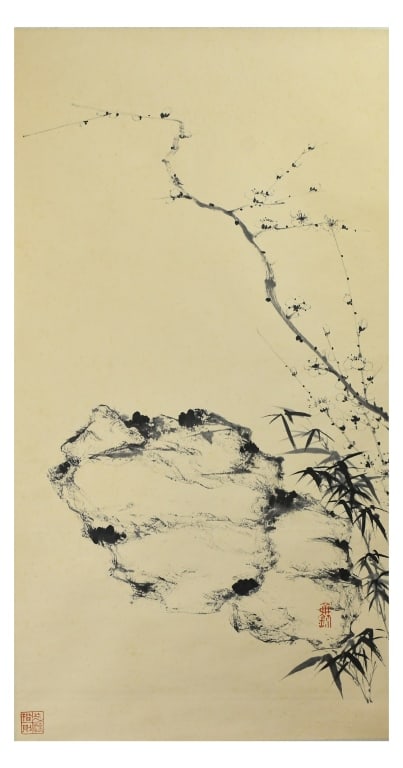 Jian QinZhai (1888-1950) Plum Bossom: Ink on paper, hanging scroll, depicting blossoming plum blossoms on the branches alongside bamboo, with rocks set in the background, with the artist's signature and seal marks. 41.3x77.9cm 簡