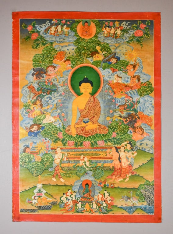 A Thangka 19thC: Depicting a centrally seated Buddha surrounded by attendants and celestial figures, all set within a richly detailed landscape. 52x73.5cm 19世紀 唐卡 Click here for